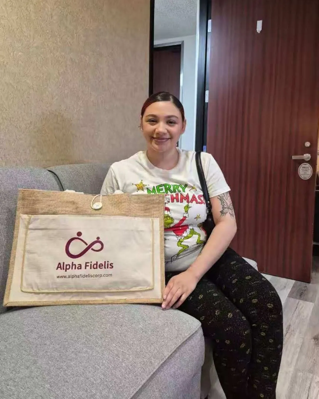 Prospective gestational surrogate smiling during her surrogacy journey with Alpha Fidelis in Southern California.