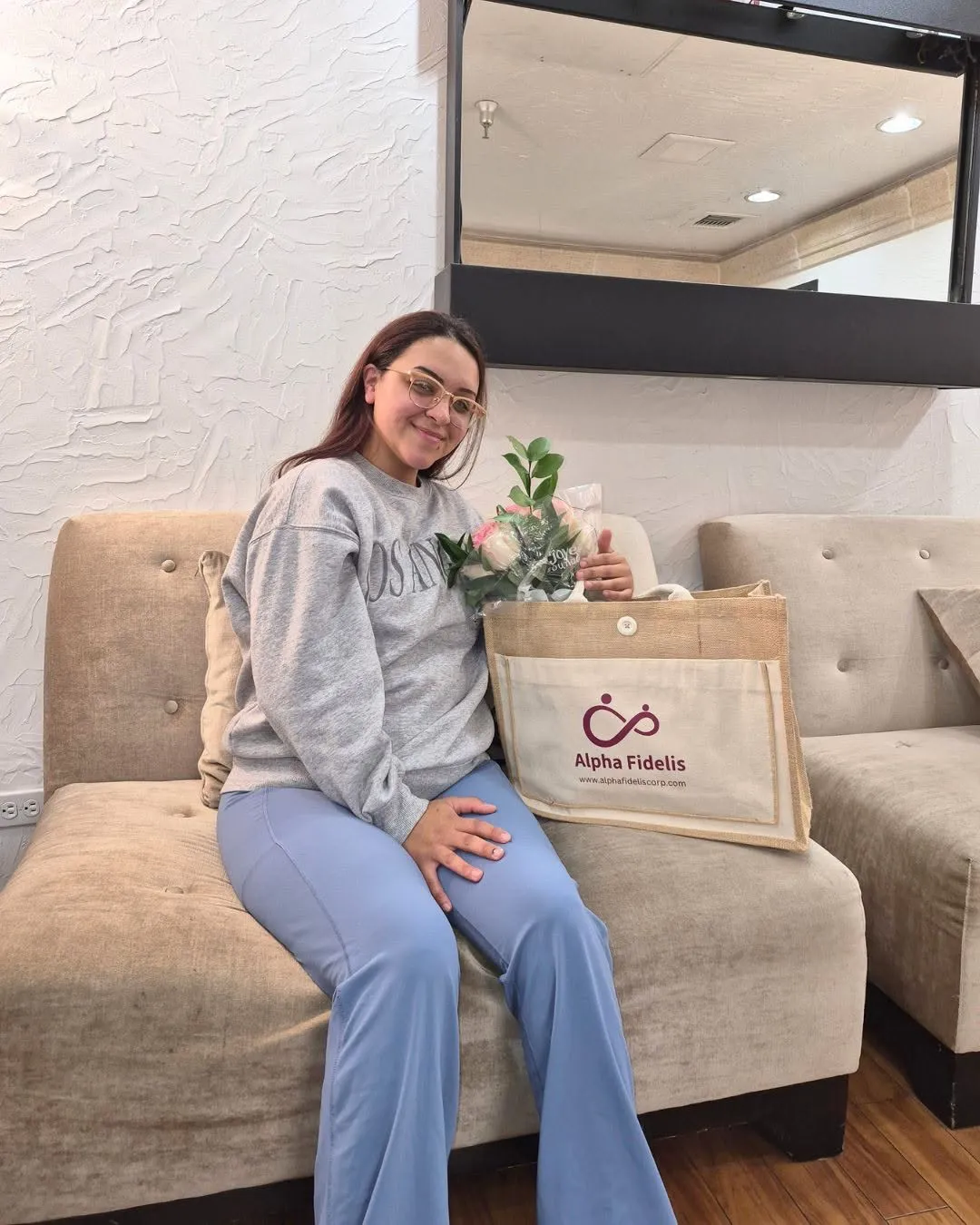 Prospective gestational surrogate smiling while learning about becoming a surrogate in Orange County.