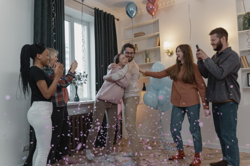 A happy intended family meeting with their surrogacy support team