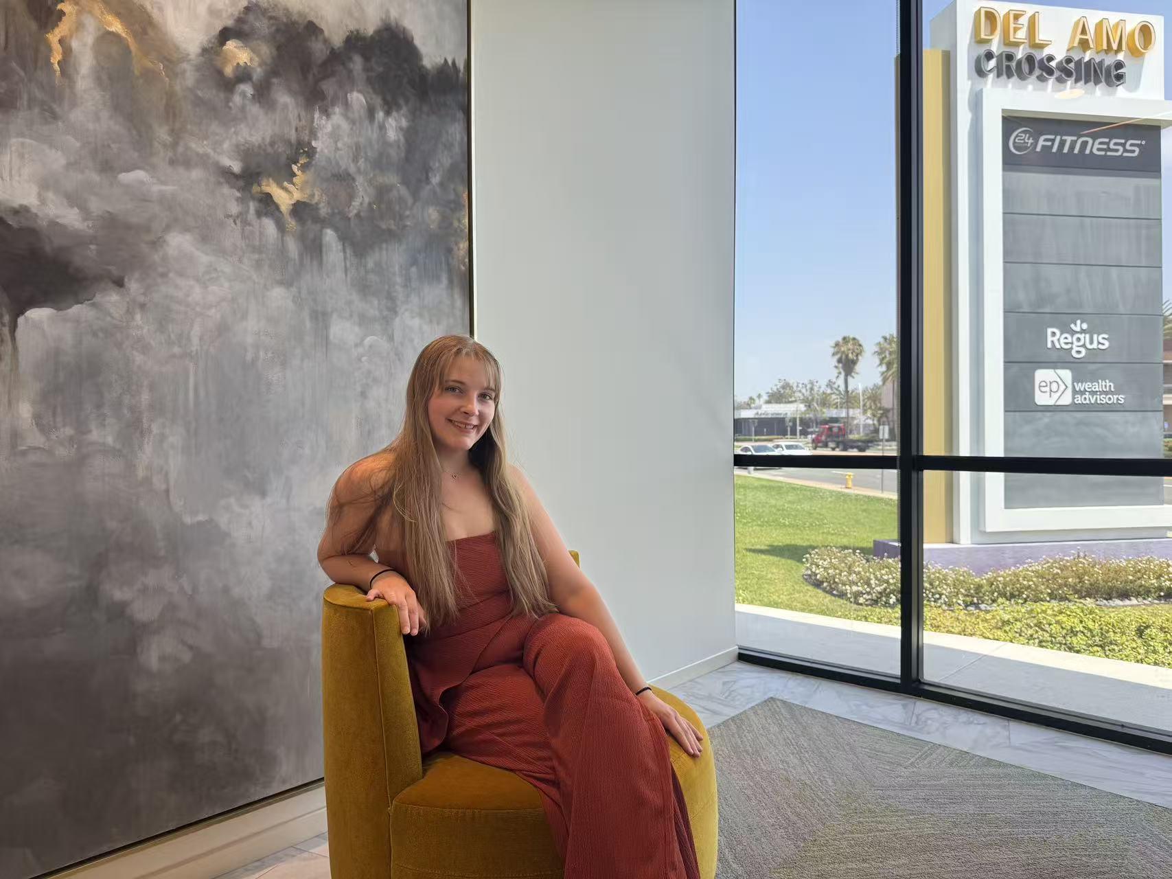 A person sitting in an armchair